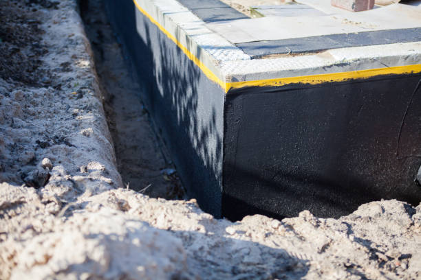 Professional Emergency Waterproofing technician working in Warsaw, OH